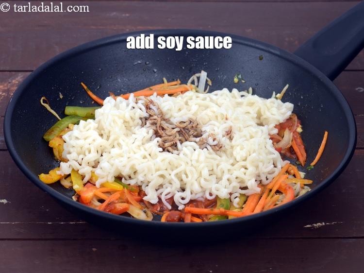 Step 21 – Add 2 tsp&nbsp;<a href="https://www.tarladalal.com/glossary-soy-sauce-soya-sauce-864i">soy sauce</a>.&nbsp;