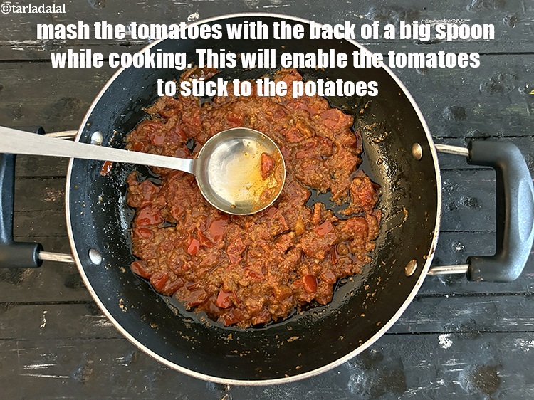 Step 29 – Mash&nbsp;the tomatoes with the back of a big spoon while cooking. This will enable the …