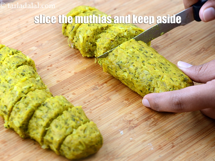 Step 21 – Slice the muthias into 12 mm ( &frac12;&rdquo;) pieces and keep aside.