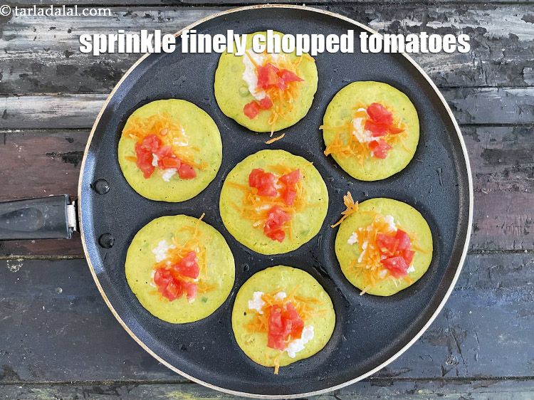 Step 21 – Spirinkle finely chopped tomatoes over it.