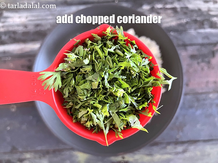 Step 23 – Add&nbsp;<meta charset="UTF-8" />1/4 cup&nbsp;<a href="glossary-chopped-coriander-783i">chopped coriander (dhania)</a>.