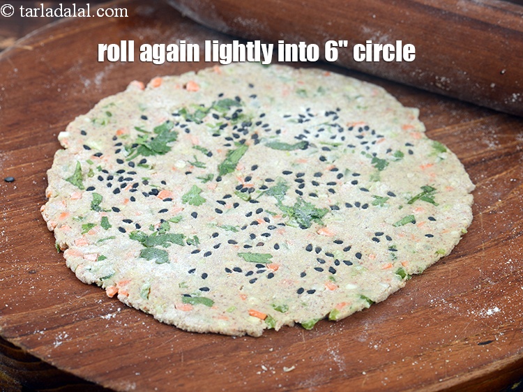 Step 21 – Roll again lightly into a 150 mm. (6&quot;) diameter circle using whole wheat flour for …