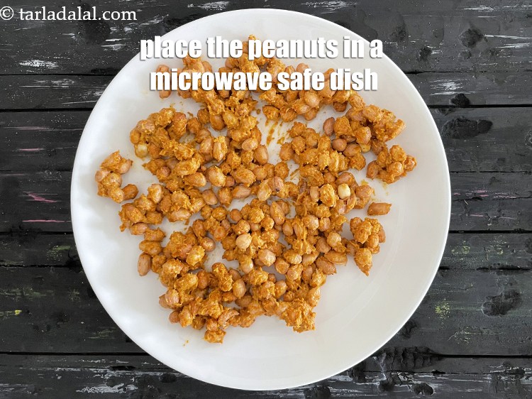 Step 22 – Place the peanut mixture on a big microwave safe plate and lightly spread them.