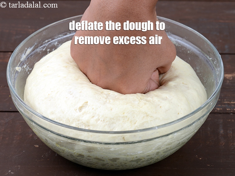 Step 21 – Deflate the dough to remove excess air.