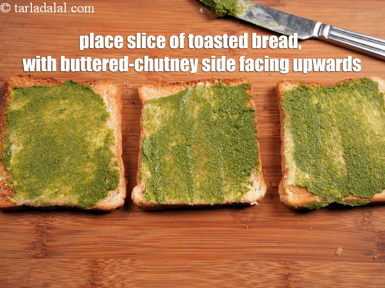 Step 23 – Place 1 slice of toasted bread, with the buttered-chutney side facing upwards, on a clean …