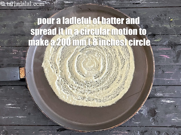 Step 25 – <meta charset="UTF-8" /> Pour a ladleful of the batter on it and spread it in …