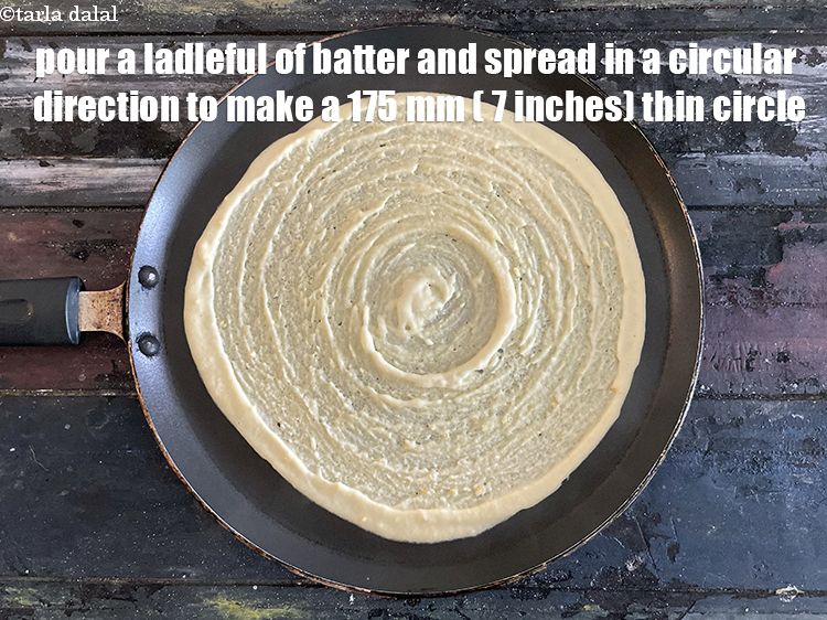 Step 26 – <meta charset="UTF-8" /> Pour a ladleful of the batter on it and spread it in …