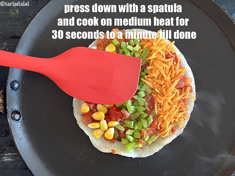 Step 29 – Press down with a spatula and cook on medium heat for 30 seconds to 1 …