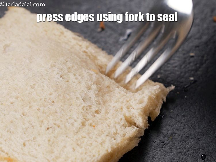 Step 21 – Press the edges using a fork to seal them properly.
