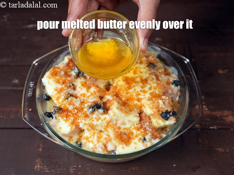 Step 21 – <p>Pour 2 tbsp &nbsp;<a href="https://www.tarladalal.com/glossary-melted-butter-1941i">melted butter</a>&nbsp;evenly over it.</p>