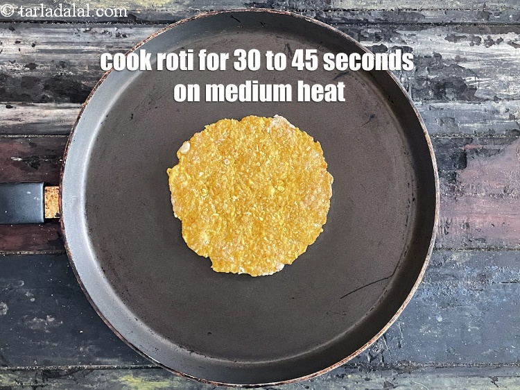 Step 22 – <meta charset="UTF-8" />Cook roti for 30 to 45 seconds on a medium flame.&nbsp;&nbsp;