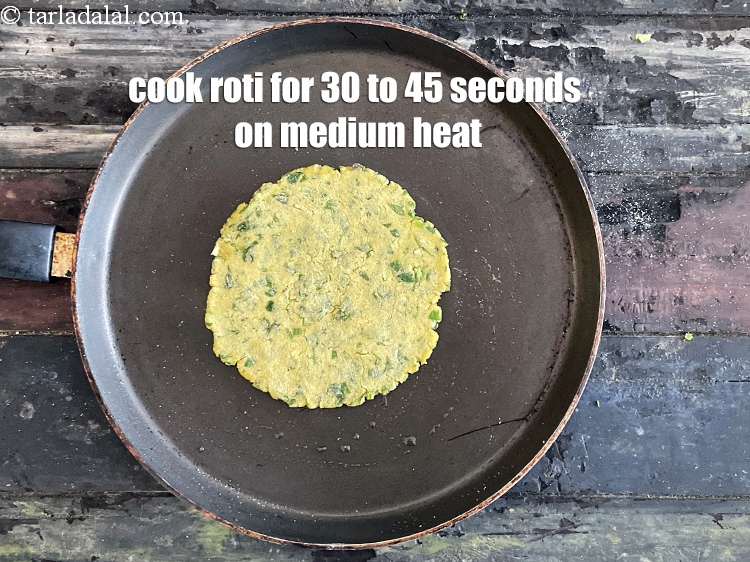 Step 21 – <meta charset="UTF-8" />Cook roti for 30 to 45 seconds on a medium flame.&nbsp;&nbsp;