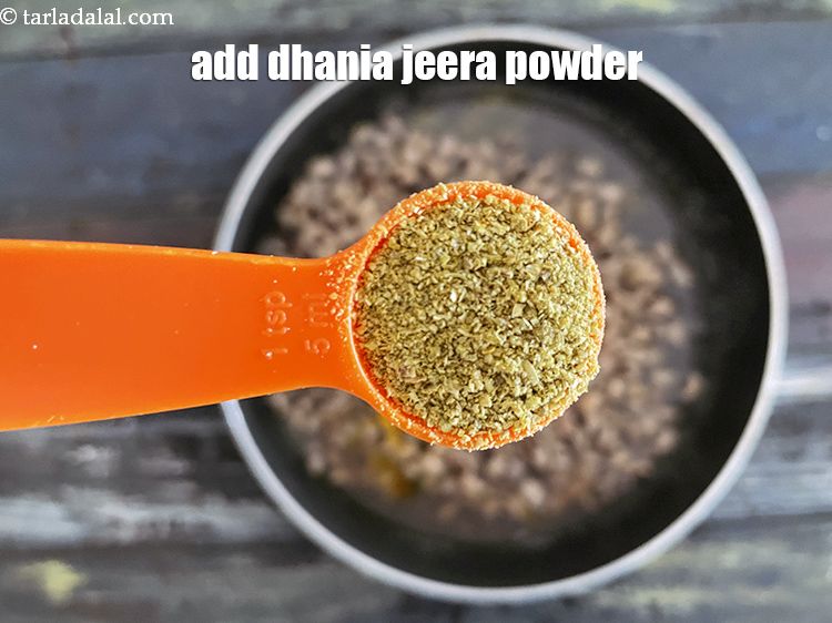 Step 23 – <p>Add&nbsp;1 tsp&nbsp;<a href="glossary-coriander-cumin-seeds-powder-dhania-jeera-powder-375i">coriander-cumin seeds (dhania-jeera) powder</a>.</p>