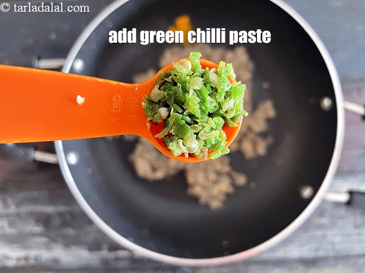 Step 28 – Add 1&nbsp;tsp&nbsp;<a href="glossary-green-chilli-paste-hari-mirch-ki-paste-mirchi-paste-333i">green chilli paste</a>.