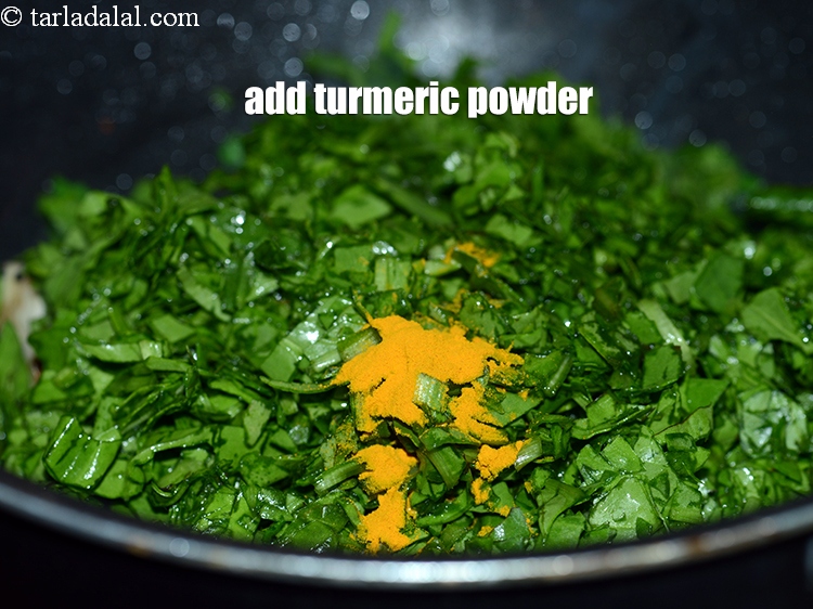 Step 22 – Add &frac14; tsp <a href="https://www.tarladalal.com/glossary-turmeric-powder-haldi-645i">turmeric powder (haldi)</a>.