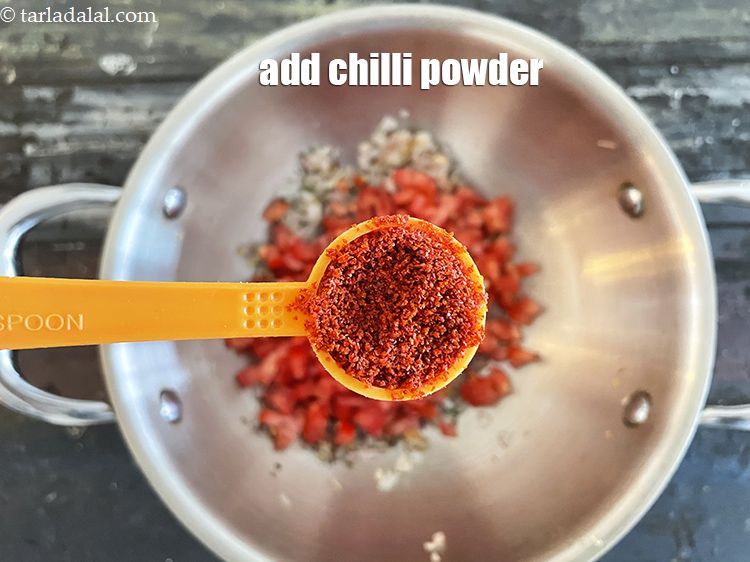 Step 30 – Add&nbsp;1 tsp&nbsp;<a href="glossary-chilli-powder-red-chilli-powder-339i">chilli powder</a>.