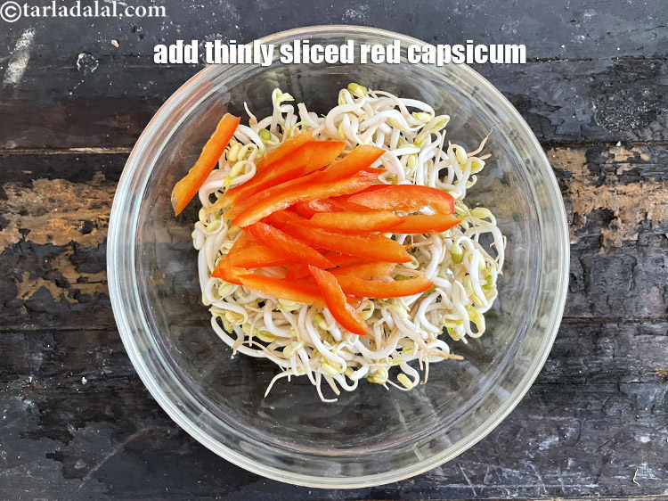 Step 15 – Add&nbsp;<meta charset="UTF-8" />1/4&nbsp;thinly&nbsp;<a href="glossary-sliced-red-capsicum-2176i">sliced red capsicum</a>.