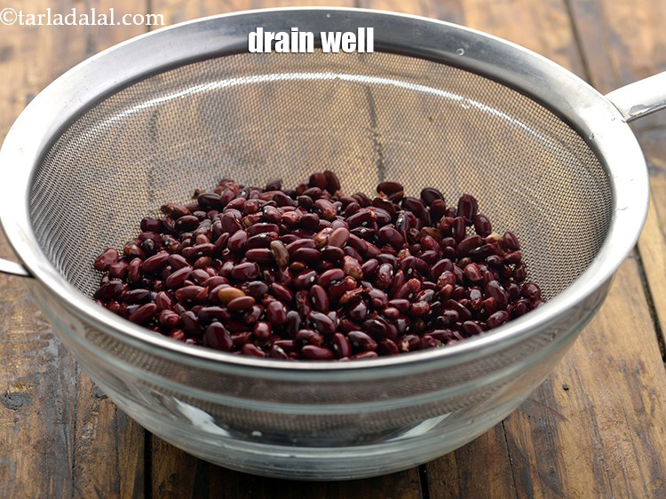Step 5 – Next day, discard the water by straining the rajmas. Rinse the rajma once again with …