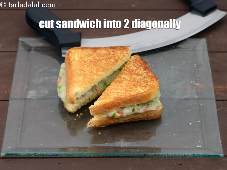 Step 21 – Cut the sandwich into 2 pieces diagonally.&nbsp;