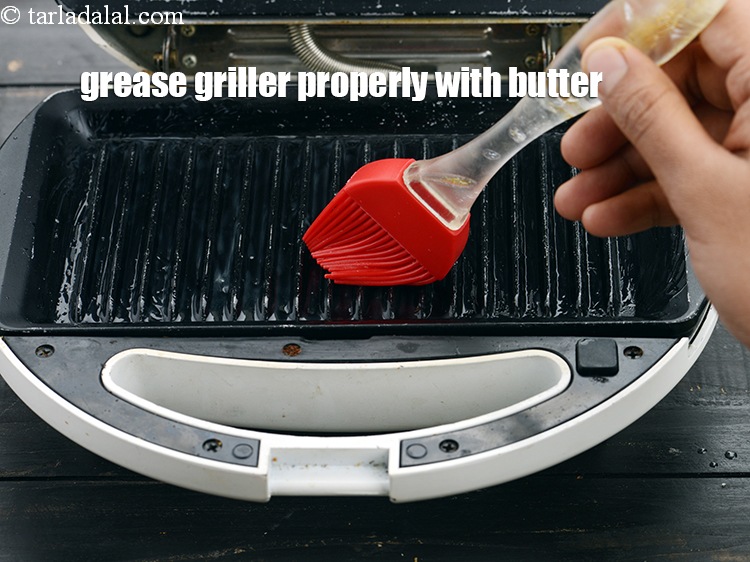 Step 21 – Grease the griller properly with butter using brush, so that the bread slice doesn&#39;t stick …