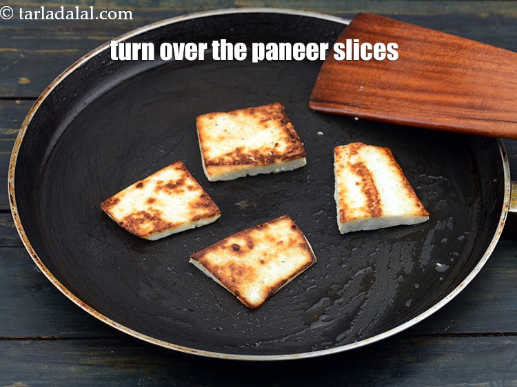 Step 22 – Turn over the paneer slices.