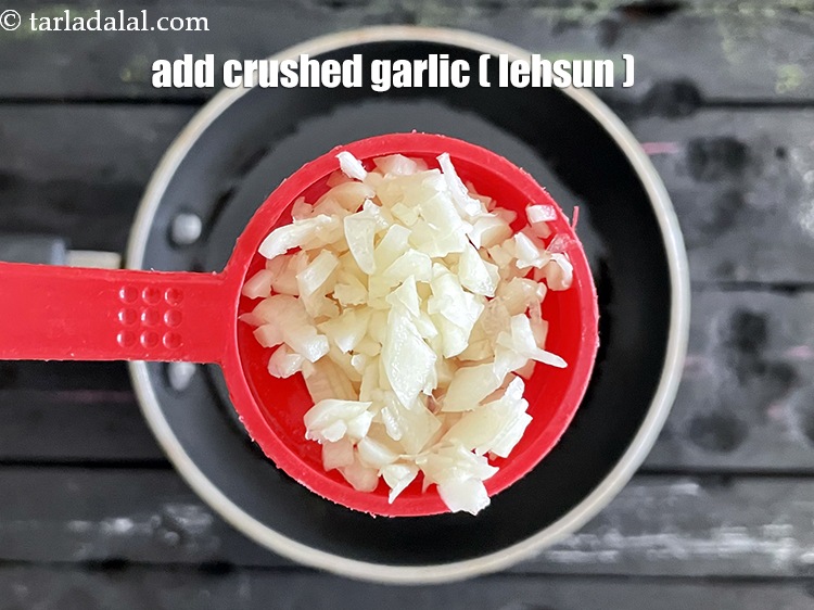 Step 24 – Add&nbsp;<meta charset="UTF-8" />1 tbsp&nbsp;<a href="glossary-crushed-garlic-870i">crushed garlic (lehsun)</a>.