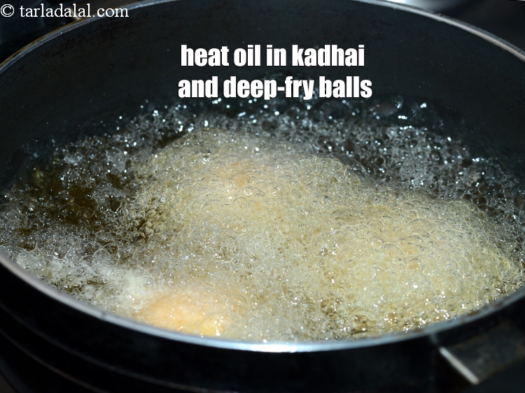 Step 21 – Heat the oil in a deep kadhai and deep-fry the balls, a few at a …