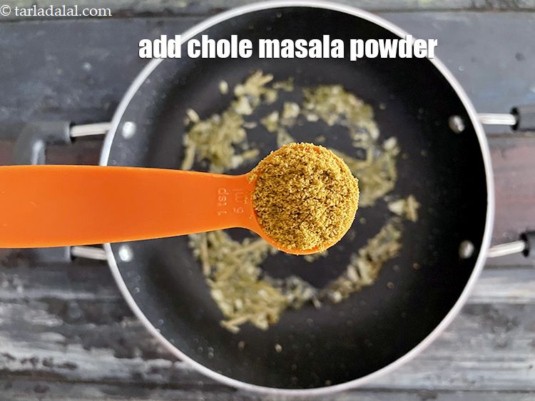 Step 21 – Add&nbsp;<meta charset="UTF-8" />2 tsp&nbsp;<a href="glossary-chole-masala-chana-masala-293i">chole masala powder</a>&nbsp;, readily available in the market.
