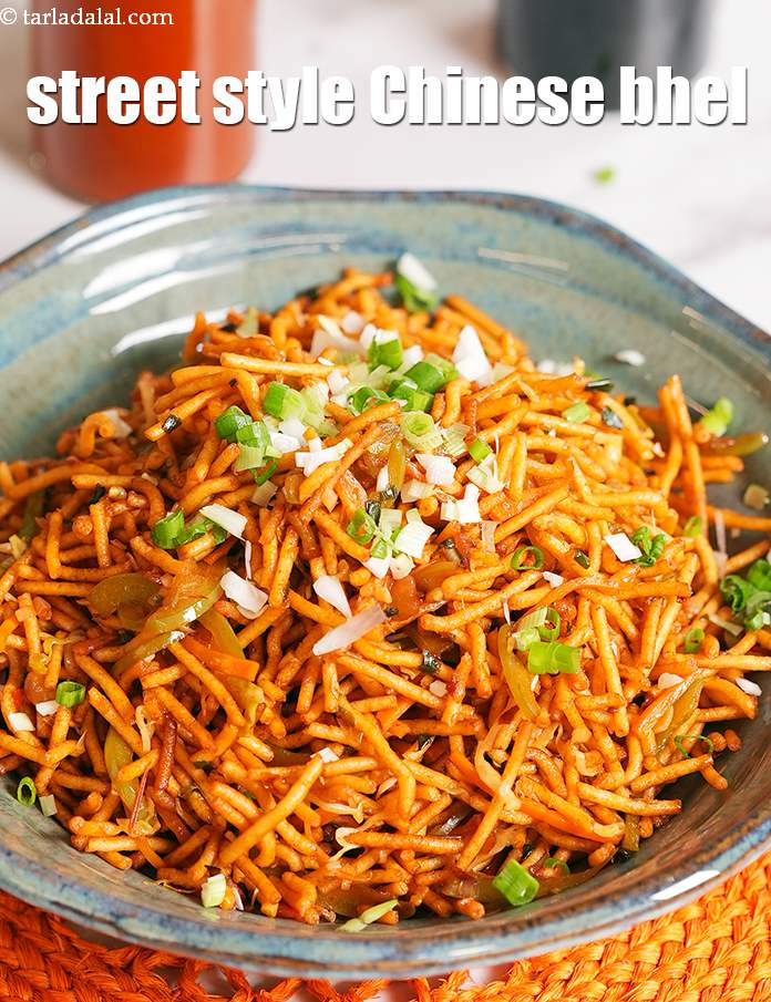 Step 21 – Serve <strong>Pan fried Chinese bhel</strong> immediately garnished with spring onion whites and greens.