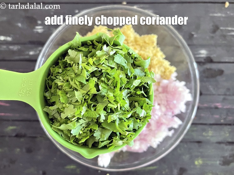 Step 22 – Add&nbsp;<meta charset="UTF-8" />1/2 cup&nbsp;finely&nbsp;<a href="glossary-chopped-coriander-783i">chopped coriander (dhania)</a>.