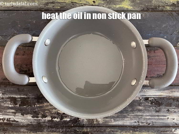 Step 21 – Heat 2 tsp oil in a non-stick kadhai.
