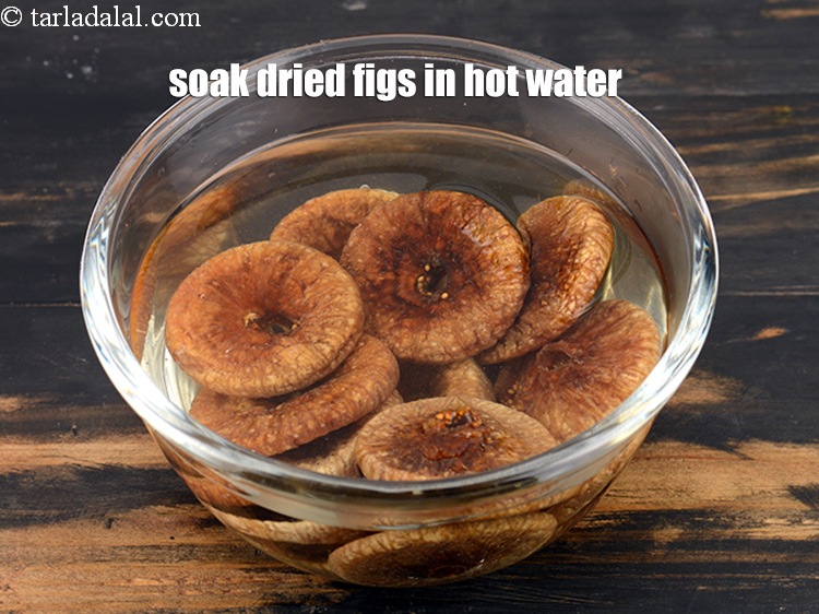 Step 3 – Soak 12&nbsp;<a href="https://www.tarladalal.com/glossary-dried-figs-sukhe-anjeer-dry-anjeer-413i">dried figs (anjeer)</a> in enough hot water in a bowl for 5 minutes.