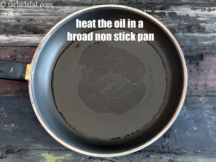Step 13 – Heat 2 tbsp of oil in a broad non-stick pan.