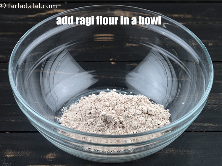 Step 3 – For the dough of <strong>ragi chakli recipe | nachni chakli | ragi murukku</strong>, add 1/4 …
