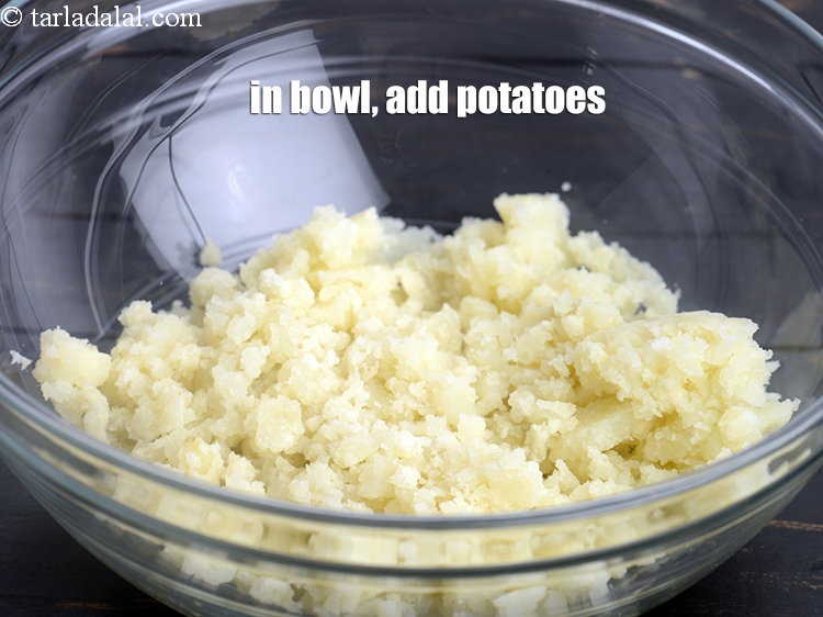Step 3 – In a deep bowl, add 1 cup&nbsp;<a href="https://www.tarladalal.com/glossary-boiled-and-mashed-potatoes-1831i">boiled , peeled and mashed potatoes</a>.