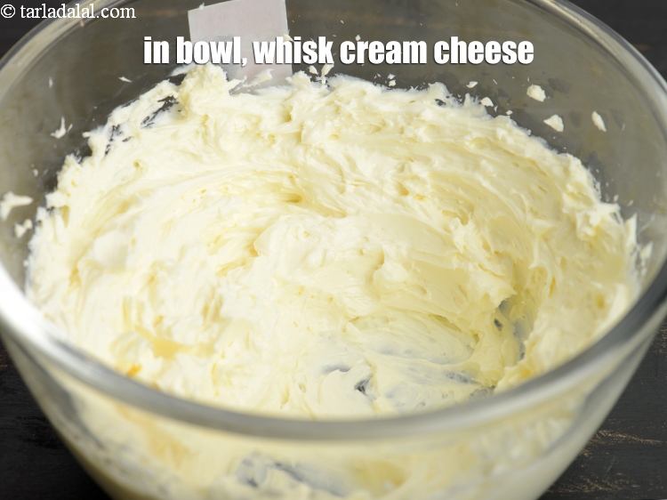Step 3 – In a bowl, whisk 5 tbsp <a href="https://www.tarladalal.com/glossary-cream-cheese-319i">cream cheese</a>.