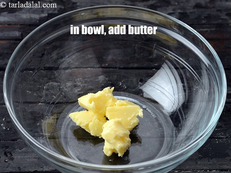 Step 3 – In a deep bowl, add &frac14; cup <a href="https://www.tarladalal.com/glossary-butter-makhan-233i">butter</a>.
