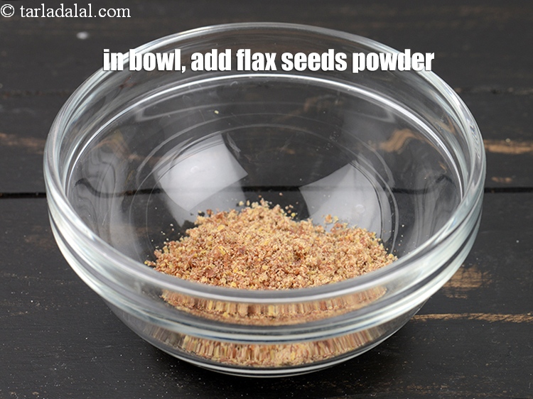 Step 3 – To make <strong>eggless crinkle cookies</strong>, in a small bowl, add 1 tbsp flax seeds powder.