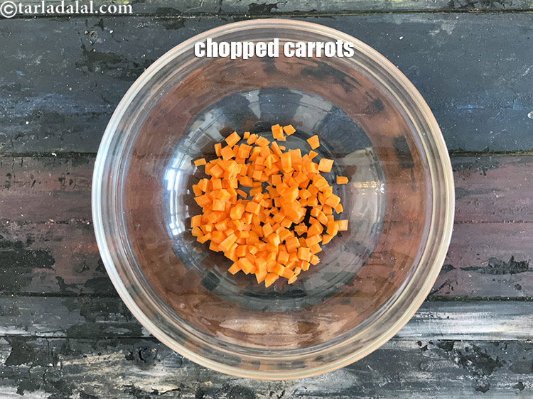 Step 4 – In a bowl put&nbsp;<meta charset="UTF-8" />1/4 cup&nbsp;finely&nbsp;<a href="glossary-chopped-carrot-798i">chopped carrots</a>.