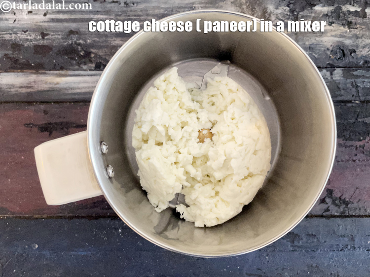 Step 4 – In a mixer put&nbsp;<meta charset="UTF-8" />3/4 cup&nbsp;grated&nbsp;<a href="glossary-paneer-cottage-cheese-chenna-985i">paneer (cottage cheese)</a>.