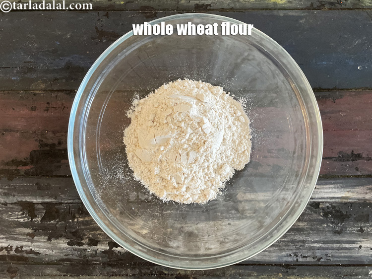 Step 5 – In a bowl put&nbsp;<meta charset="UTF-8" />3/4 cup&nbsp;<a href="glossary-whole-wheat-flour-gehun-ka-atta-gehun-ka-aata-429i">whole wheat flour (gehun ka atta)</a>.