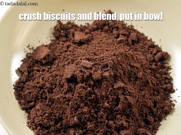 Step 3 – To make <strong>biscuit cake in a pan</strong>, crush 3 packets of&nbsp;<a href="https://www.tarladalal.com/glossary-oreo-biscuits-oreo-cookies-1223i">oreo biscuits</a> and blend …