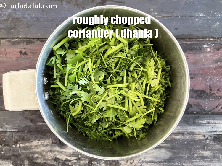 Step 6 – In a mixer put&nbsp;<meta charset="UTF-8" />1 cup&nbsp;roughly&nbsp;<a href="glossary-chopped-coriander-783i">chopped coriander (dhania)</a>.