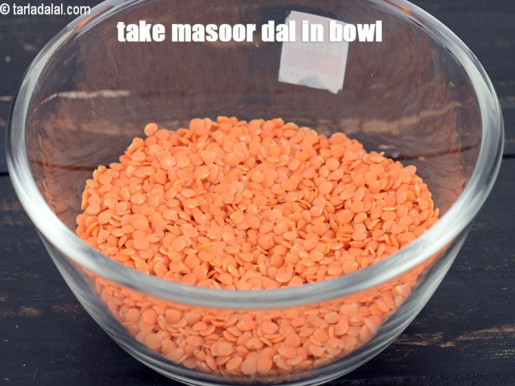 Step 3 – Take &frac34; cup <a href="https://www.tarladalal.com/glossary-masoor-dal-split-red-lentil-masoor-ki-dal-303i">masoor dal (split red lentil)</a>&nbsp;in a deep bowl.