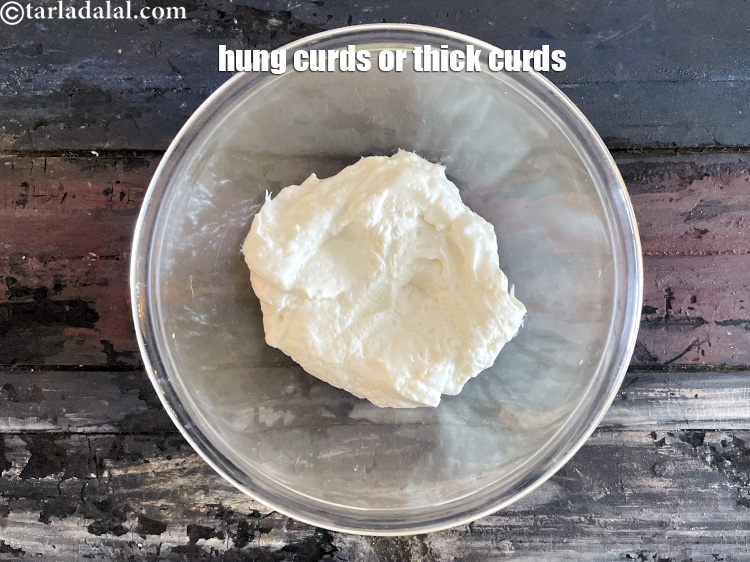 Step 7 – In a bowl, put&nbsp;<meta charset="UTF-8" />3/4 cup hnng curd. See above on how to make …