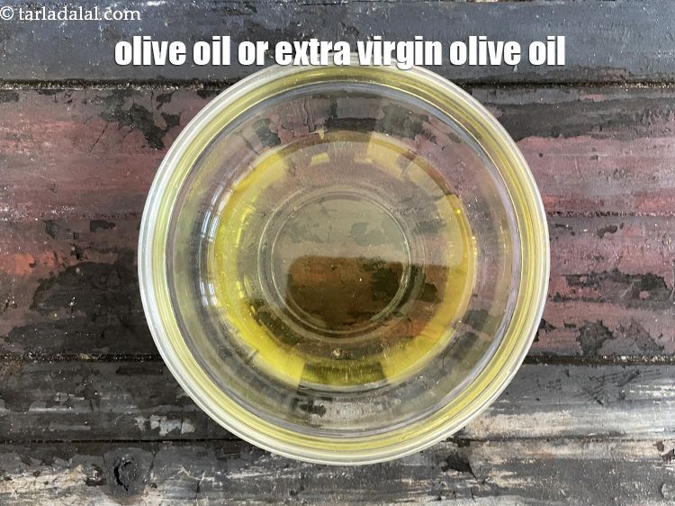 Step 3 – In a bowl put olive oil.