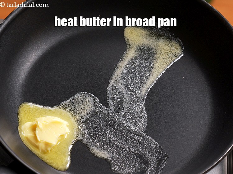 Step 3 – To make <strong>spinach and corn puff</strong>, heat 1 tbsp butter in a broad non-stick.