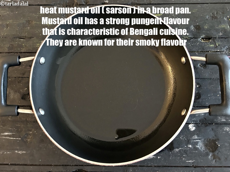 Step 29 – <meta charset="UTF-8" /> Heat 2 tbsp <a href="glossary-mustard-oil-rai-ka-tel-sarson-ka-tel-942i">mustard (rai / sarson) oil</a> in a broad …