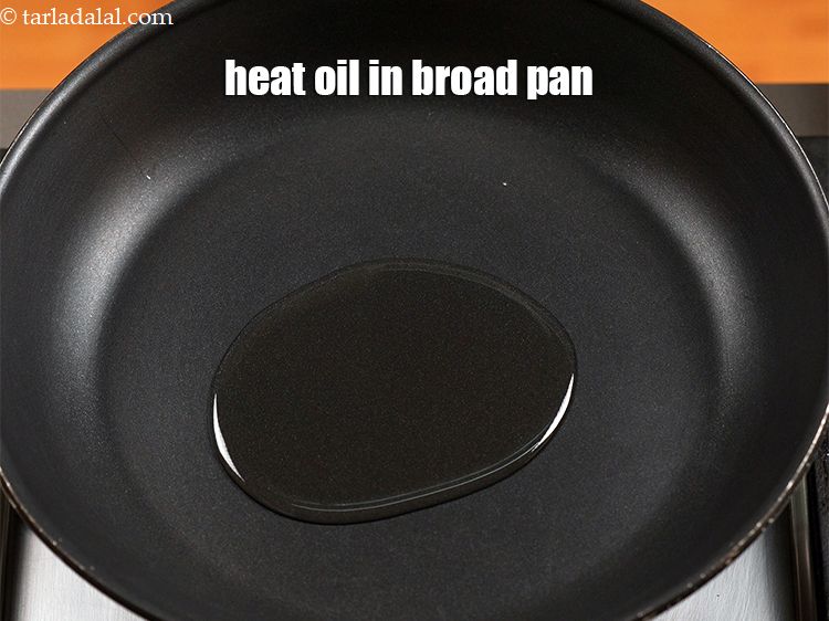 Step 5 – Heat 1 tbsp oil in a broad non-stick pan.