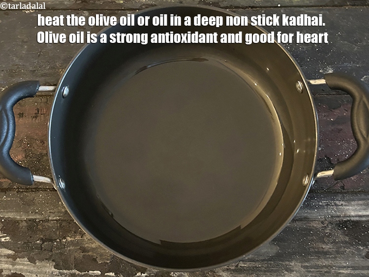 Step 32 – <meta charset="UTF-8" /> Heat&nbsp;olive oil or oil in a&nbsp;deep non-stick kadhai.&nbsp;Olive oil is a&nbsp;<a href="https://www.tarladalal.com/recipes-for-Antioxidant-Rich-1054">strong …
